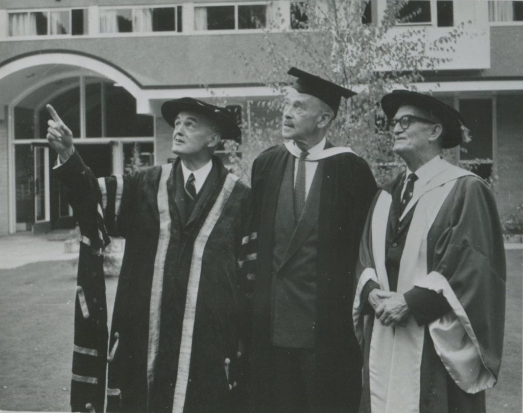 Black and white photograph of Arthur Dean, Richard Casey and Samuel Wadham outside the newly-completed Samuel Wadham Wing at International House