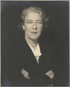 Black and white portrait of Lady Maie Casey with her arms folded