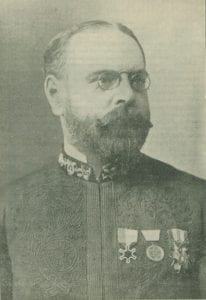 Black and white, head and shoulders portrait of John Philip Sousa in military attire.