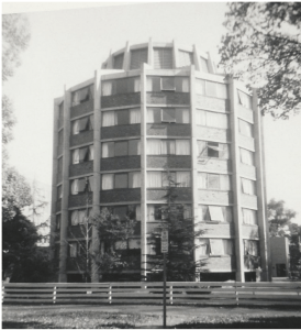 Black and white photography of multi storey building.