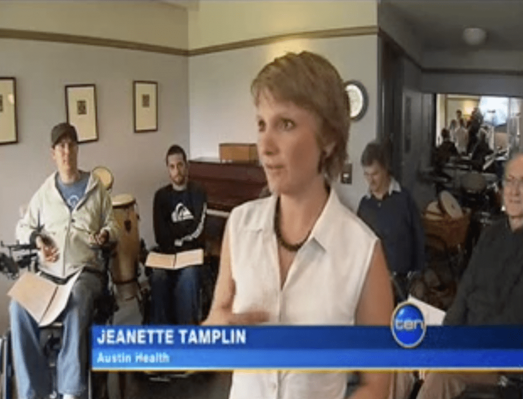 Screenshot of Channel 9 new story showing a music therapist being interviewed with a group of people in wheelchairs in the background